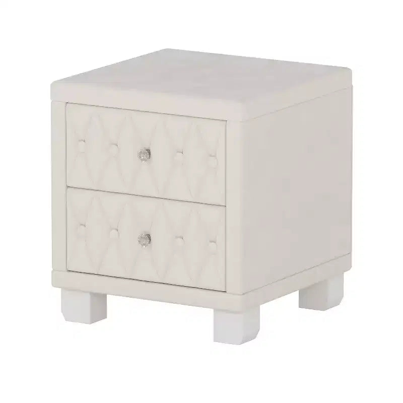 Table de chevet 2 tiroirs capitonnée crème/blush avec façade capitonnée en losanges et poignées en cristal