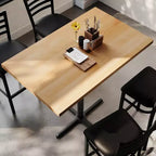 Table de bar brun foncé/naturel avec plateau et pied en X noir, 4 places