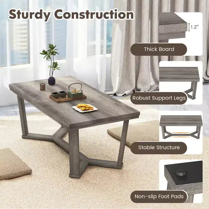 Table basse rectangulaire grise avec piètement croisé à 4 pieds, 1 à 4 places